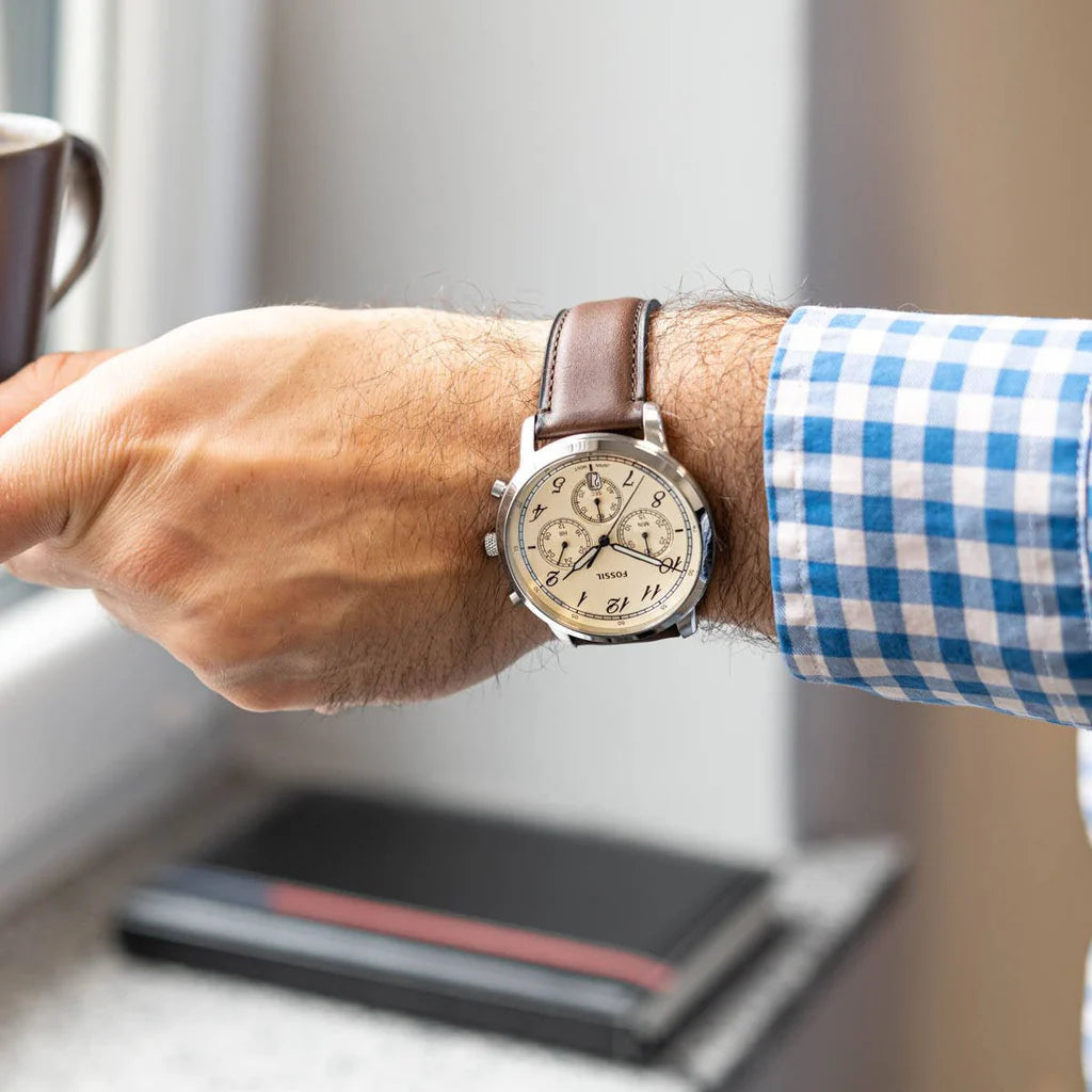 FOSSIL FS6022 Neutra Chronograph Men's Watch with cream dial, silver case, and brown leather strap.