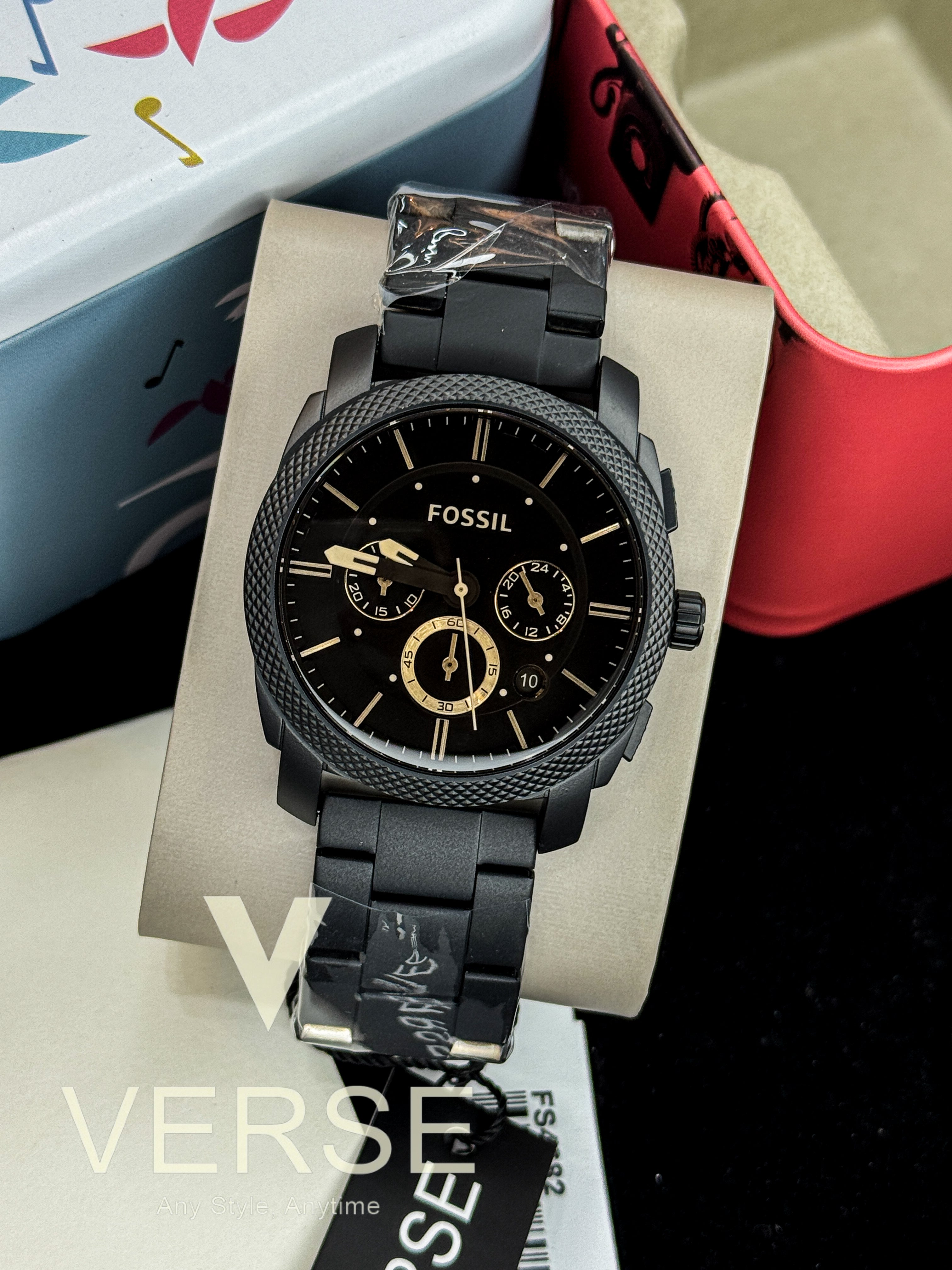 FOSSIL FS4682 Machine Mid-Size Chronograph Men's Watch with black dial and black stainless steel bracelet.