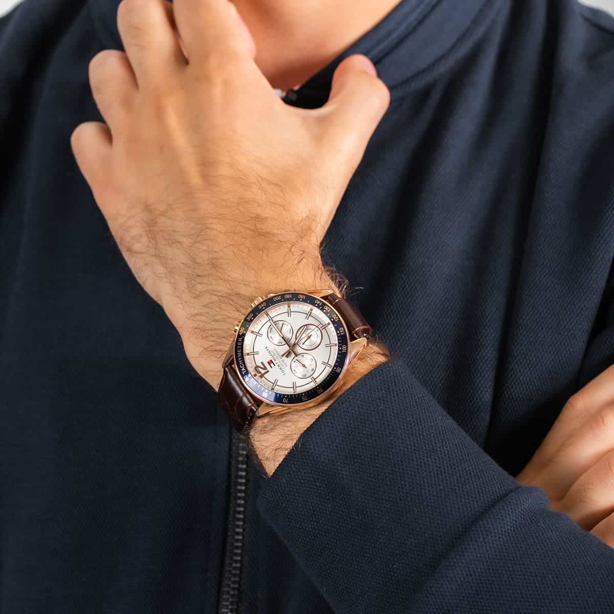 TOMMY HILFIGER 1791118 Luke Multifunction Men's Watch with rose gold-tone case, white dial, and brown leather strap.