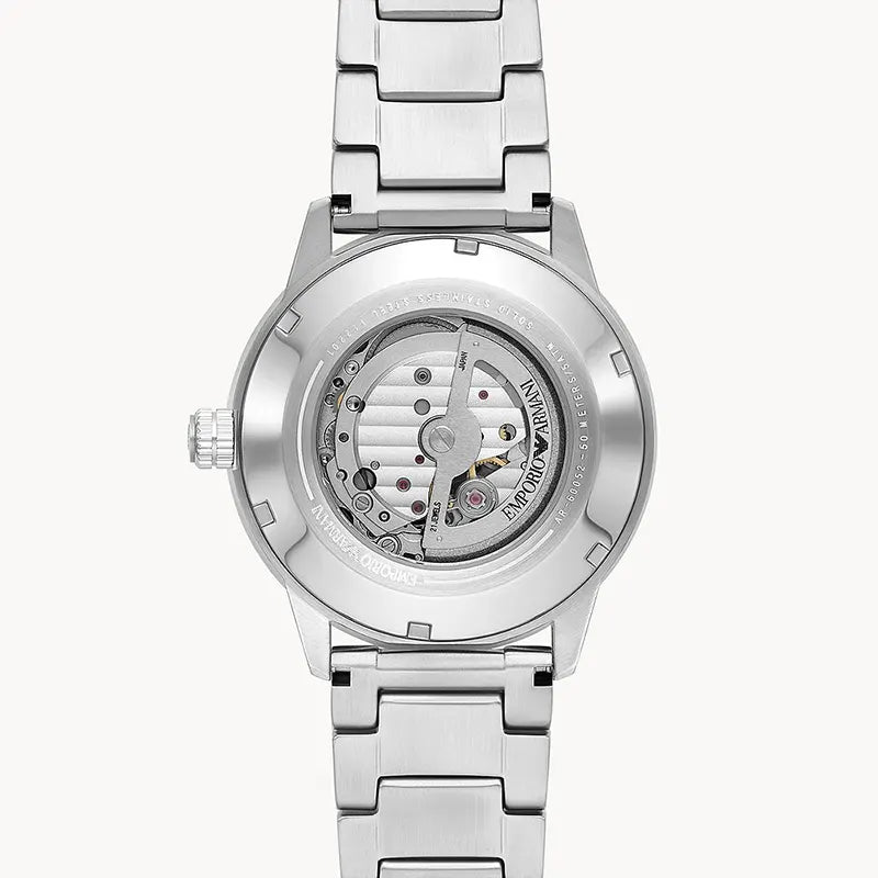 EMPORIO ARMANI AR60052 Mario Automatic Men's Watch with blue skeleton dial and silver stainless steel bracelet.