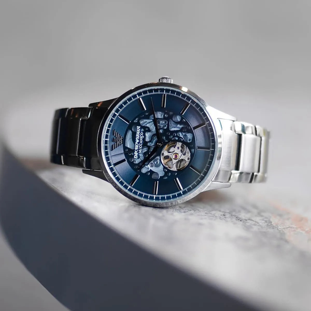 EMPORIO ARMANI AR60056 Renato Automatic Men's Watch with blue dial, gunmetal stainless steel case, and bracelet.