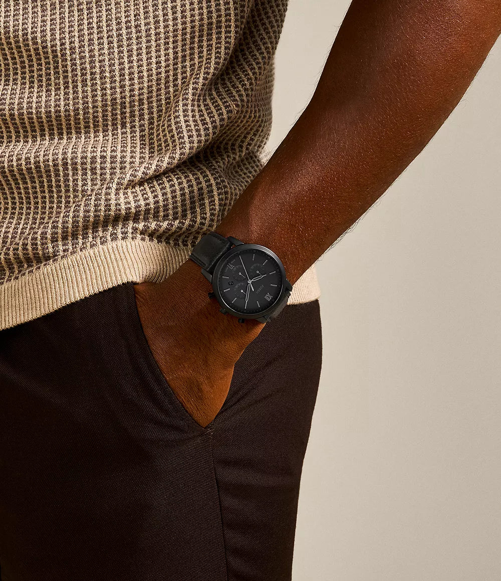 FOSSIL FS5503 Neutra Chronograph Men's Watch with black case, black dial, and black leather strap.
