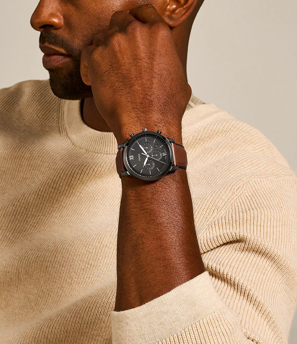 FOSSIL FS5512 Neutra Chronograph Men's Watch with smoke/gunmetal case, grey dial, and amber brown leather strap.
