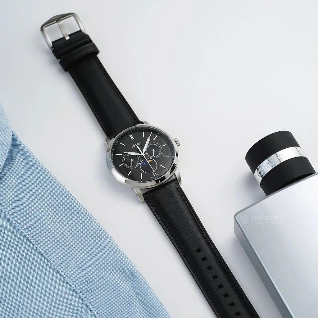Men's Watch with black dial, silver case, and black leather strap.
