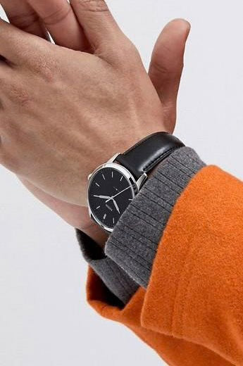 FOSSIL FS5398 The Minimalist Men's Watch with black dial, silver case, and black leather strap.