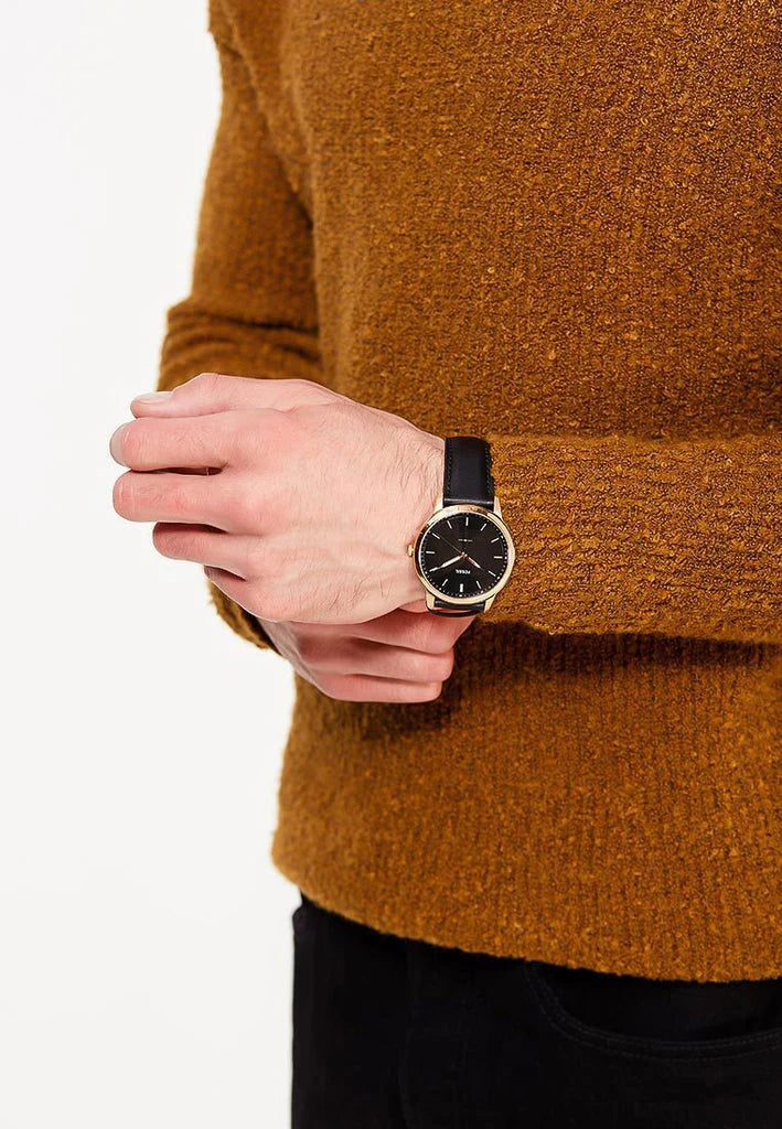 FOSSIL FS5376 The Minimalist Men's Watch with rose gold-tone case, black dial, and black leather strap.